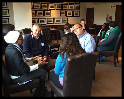 Professors and students engaged in cross-gender dialogue  Gender Reconciliation Workshop